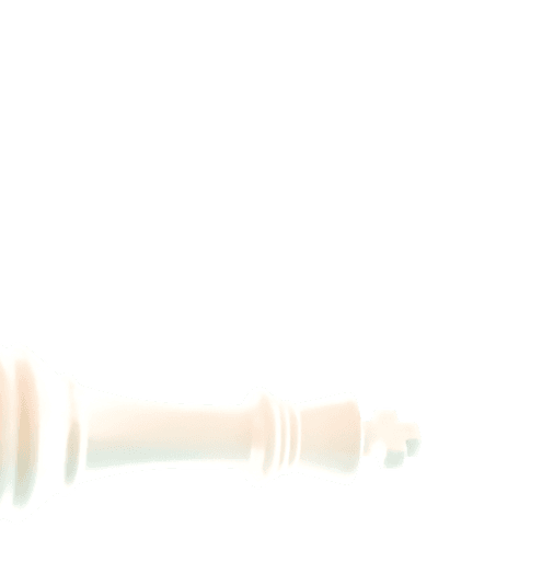 White chess king piece lying on its side